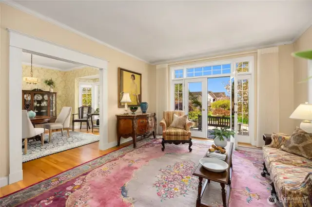 Western facing and dramatic views from the formal living room. An ideal room for entertaining with a seamless transition to the patio, formal dining and kitchen beyond.