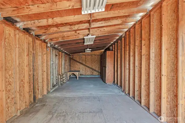 Large storage area with doors on side and end for easy access