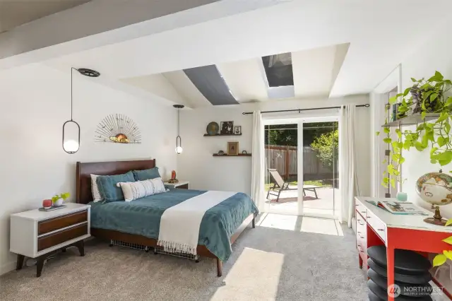 Skylights and a slider to your backyard oasis! Yes, water views from here too!