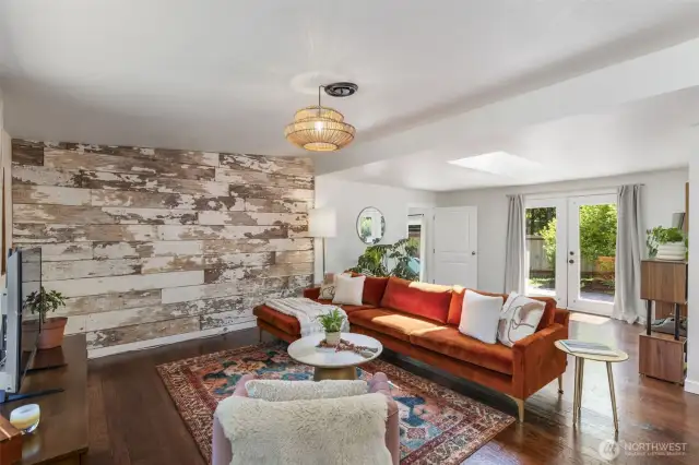 Living area with French doors leading to your lake front backyard! Gorgeous water views from these French doors!