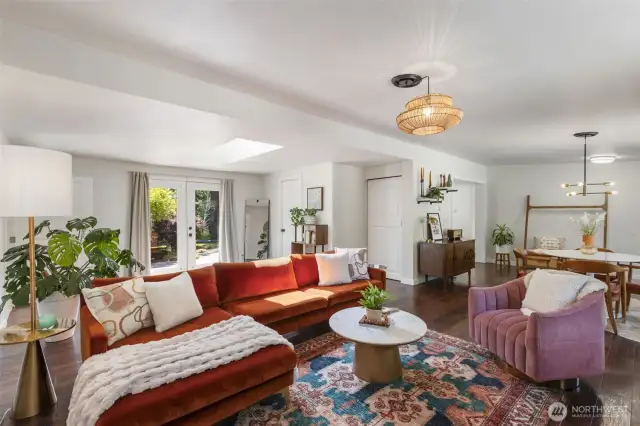 Living space looking onto the dining and French doors to your lake front back yard oasis!