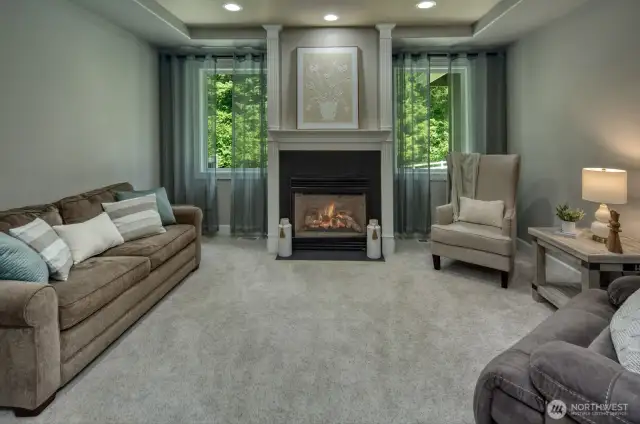 This versatile flex space, framed by glass-paneled French doors and frosted windows, is ideal as a guest room, home office, or playroom—offering privacy without sacrificing natural light or connectivity to the main living area.