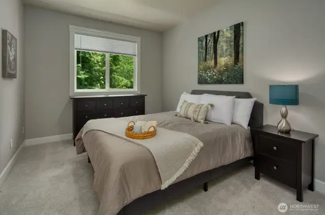 One of three upstairs bedrooms—perfect for guests, family, or a additional home office.