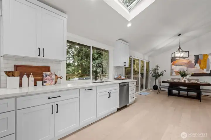Huge kitchen windows could also be used to pass things through to friends on the deck.