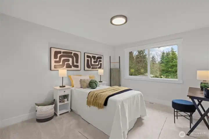 Upstairs bedroom number two provides plenty of room as well as peaceful views.