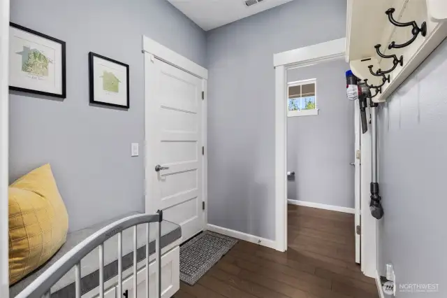 Mudroom off the kitchen to access the garage and powder bathroom.