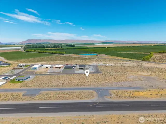 Aerial view of lot facing orchards.