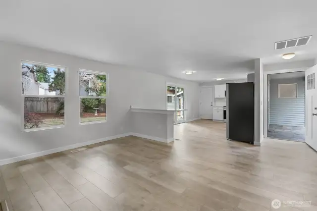 Fabulous open concept Living space with new light fixtures.