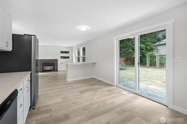Peninsular counter with eating bar provides definition between the Kitchen/Dining and Living space. Perfect for entertaining.