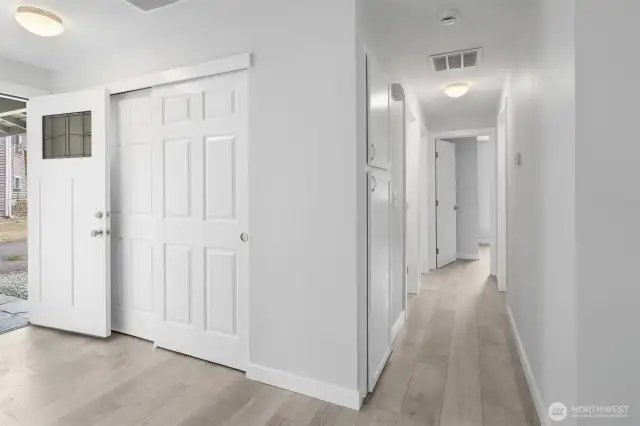 Hallway leads to three bedroom and full bathroom.