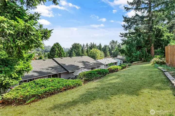 Upper yard is perfect for gardening or play.