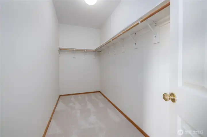 Spacious walk-in closet off primary suite.