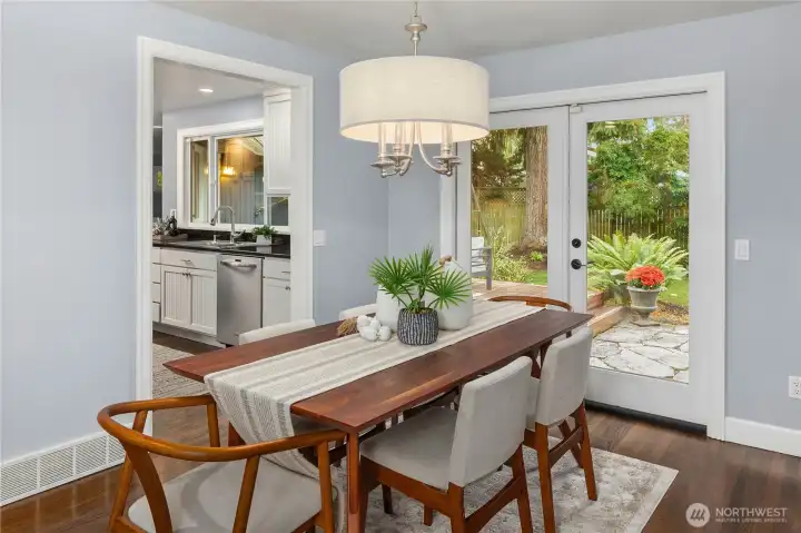 Dining room w/French doors to patio.