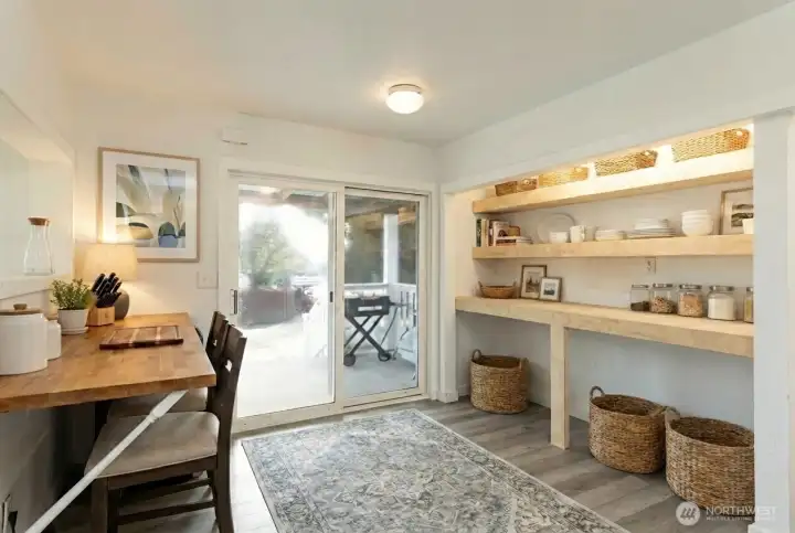 Bonus pantry/mudroom off the kitchen, digitally staged.