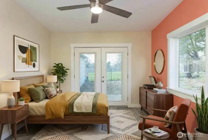 Bonus room on the main floor (digitally staged) with a few options. How about a guest room? French doors to patio, convenient ceiling fan.