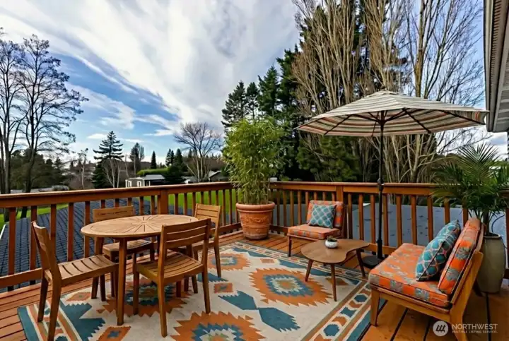 Another vantage point from the large deck area off 4th bedroom. Digitally staged