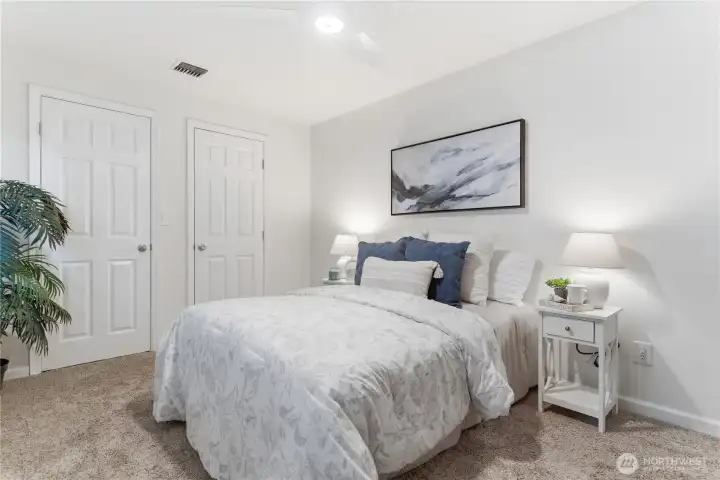 Primary bedroom features two walk-in closets.