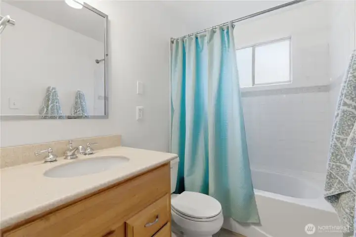 Very functional bathroom with new sink and faucets.