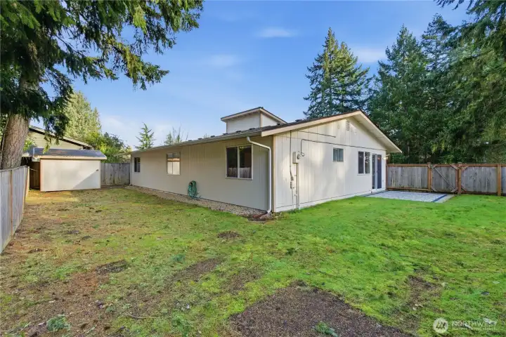 The rear yard is fully fenced and is a blank canvas for you to create "Your" space.