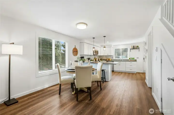 Open sightlines to the living room and kitchen make the space feel connected and spacious.