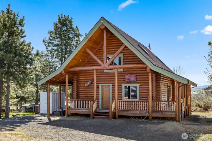 This charming log home has all the amenities and more.