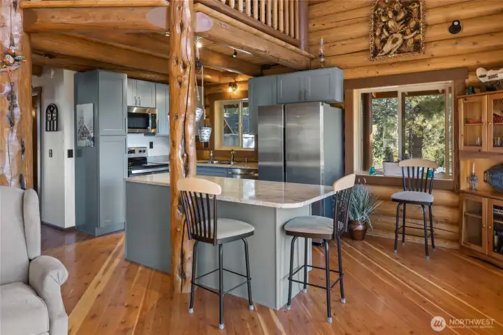 Another view of this amazing kitchen with a large center island, because everyone always ends up at the island enjoying each others company.