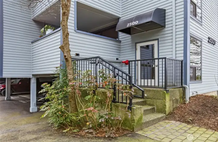 Enter through door this door closest to the street and go up one flight of stairs. Go to unit #216 (On right side).