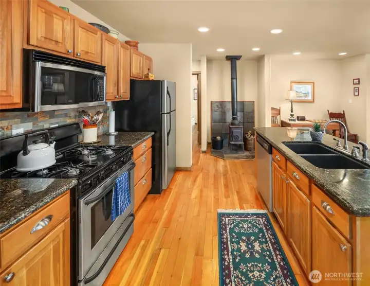 Easy flowing kitchen integrates with open concept living