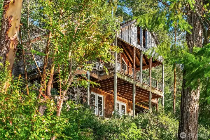 NW corner of home. Note: the lower French door sets lead to an unfinished 1500+ SF basement; its flooring is currently under construction via permit.