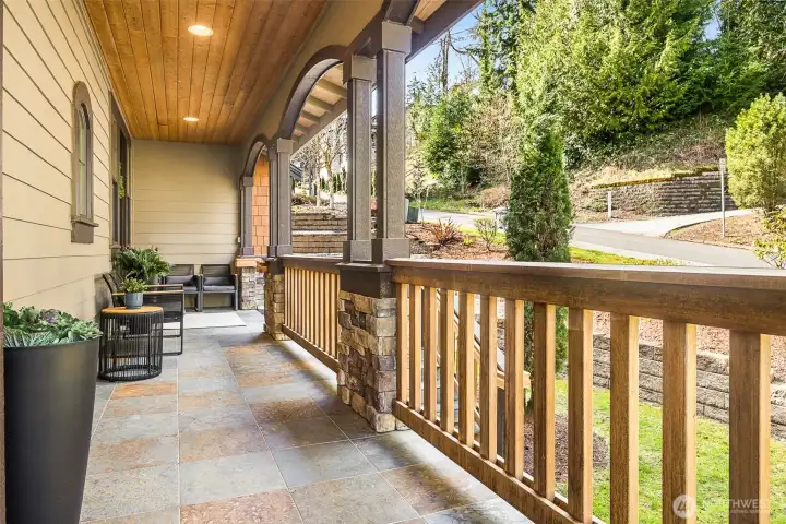 The featured wraparound front porch; a direct access form the main level den or bedroom.