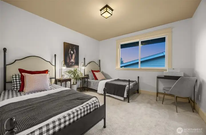 A large bedroom with custom closet