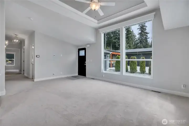 Plenty of natural light from these tall windows in the living room
