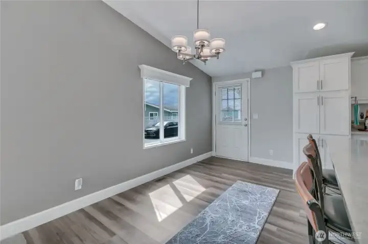 Dining space with a side door entrance