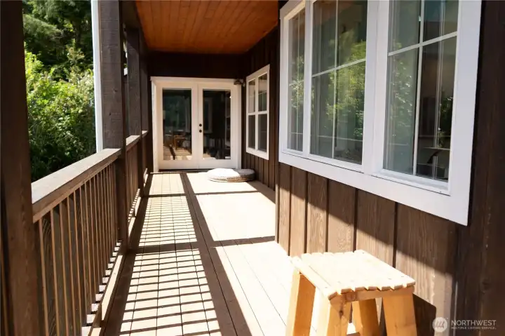 Primary bedroom has deck access.