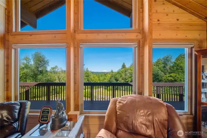 Great room with oversized windows to soak in the view Great room with oversized windows to soak in the view
