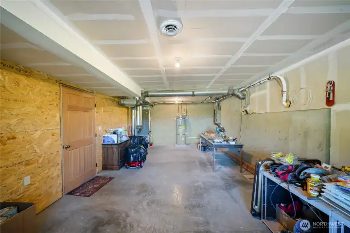 Basement room with mechanical would make a good hobby shop or office Basement room with mechanical would make a good hobby shop or office