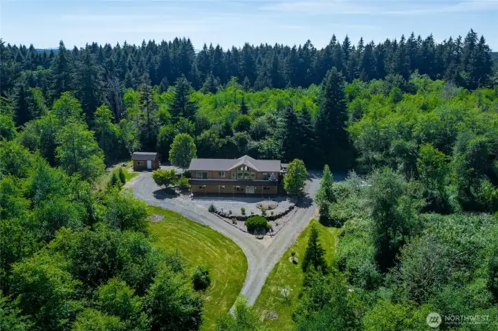 From the east showing home nestled on private hillside From the east showing home nestled on private hillside