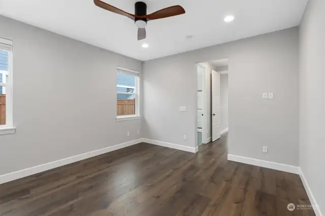 Elegant Master Suite - This room combines sophistication and practicality with a spacious walk-in closet for supreme comfort.