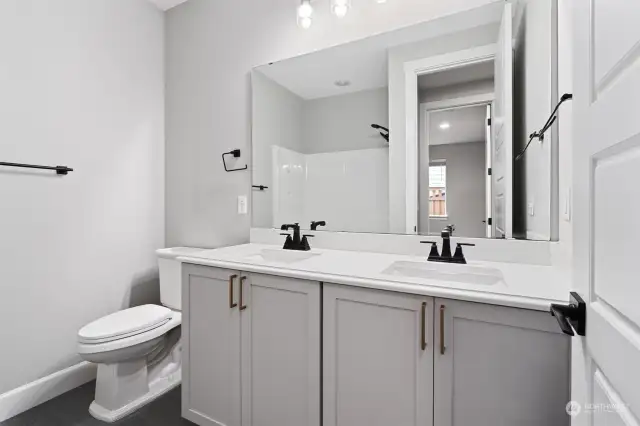 Elegant guest bath with modern finishes.