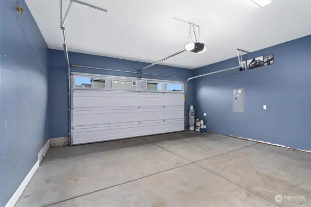 Spacious 2-Car Garage: Ample room for vehicles and storage, enhancing convenience and security.