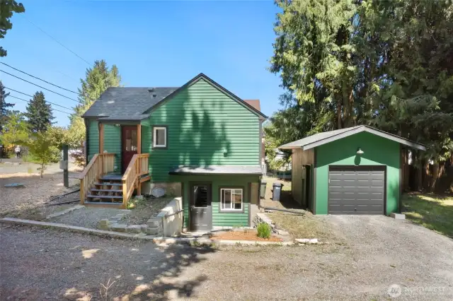 Side view of the home and detached garage