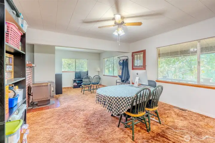 This huge open area gives you so many options for how it can be used. Whether you envision it as a gathering space, a workshop, or simply extra storage, the size allows for flexibility. Look out from any window and you’ll notice the forest surrounding the home, bringing natural light and greenery into every corner. It is a space that feels both expansive and connected to the outdoors.