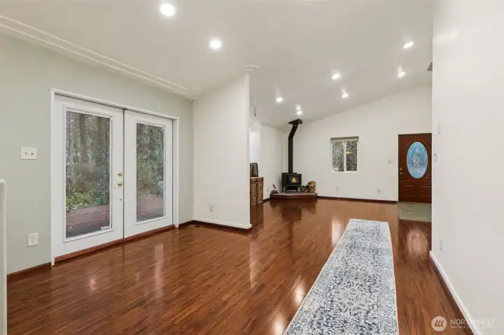 View from kitchen to your dining area and family room. Really nice recessed lighting brightens up even the cloudiest of days.