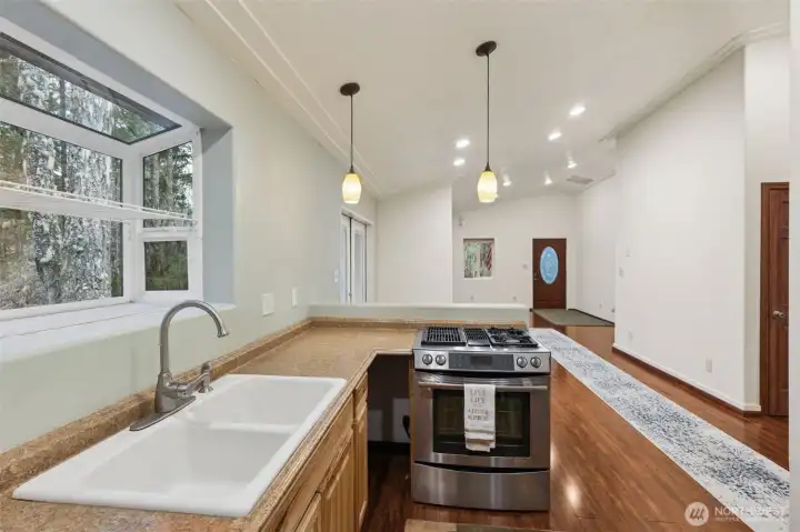 Kitchen view two, love the larger window for your plants and view!
