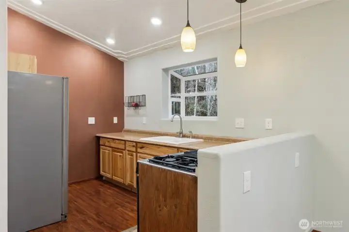 Kitchen view three, note the detail in the ceiling.
