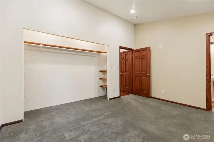 Back bedroom's HUGE closet, ensuite bath to your right.