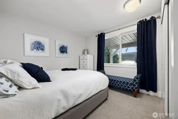 Lower level bedroom with lake views.
