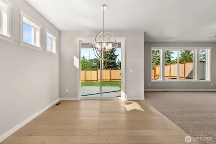 Dining area and sliding doors leading to back patio.