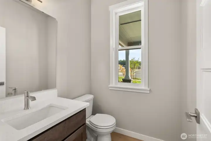 Half bath on main floor, perfect for guests.