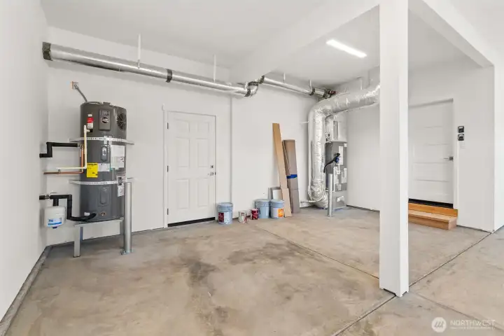 High efficiency Carrier electric forced-air furnace and Electric hybrid water heater.